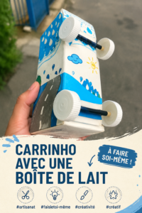 Chariot en bois fait maison avec boîte de lait, décoré avec des peintures colorées.