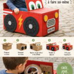 Une voiture en carton colorée fabriquée par des enfants, avec des décorations créatives.