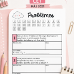 Mini-fichiers MHM CE1 sur un bureau d'enseignant, illustrant des ressources pédagogiques.