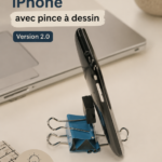 Support DIY pour iPhone fabriqué à partir d'un clip binder, sur une table