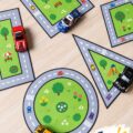 Enfant jouant à un jeu de forme en voiture, concentré et amusé